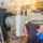 Technicians performing boiler preventative maintenance plans service on industrial boiler control panel and burner system