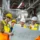 Engineering team reviewing boiler room design plans in a mechanical facility