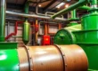 Industrial boiler room piping and pressure vessels featured in how to size a deaerator guide