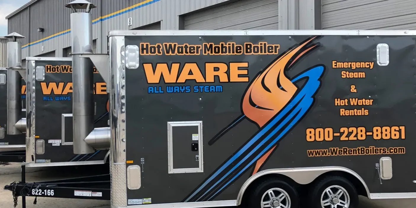 ware-trailer-mounted-rental-boiler-arizona Ware trailer-mounted rental boiler in Arizona parked outside a commercial facility