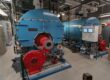 Water treatment for commercial boilers in an Arizona facility showing Kewanee boilers with burner assembly and control panel