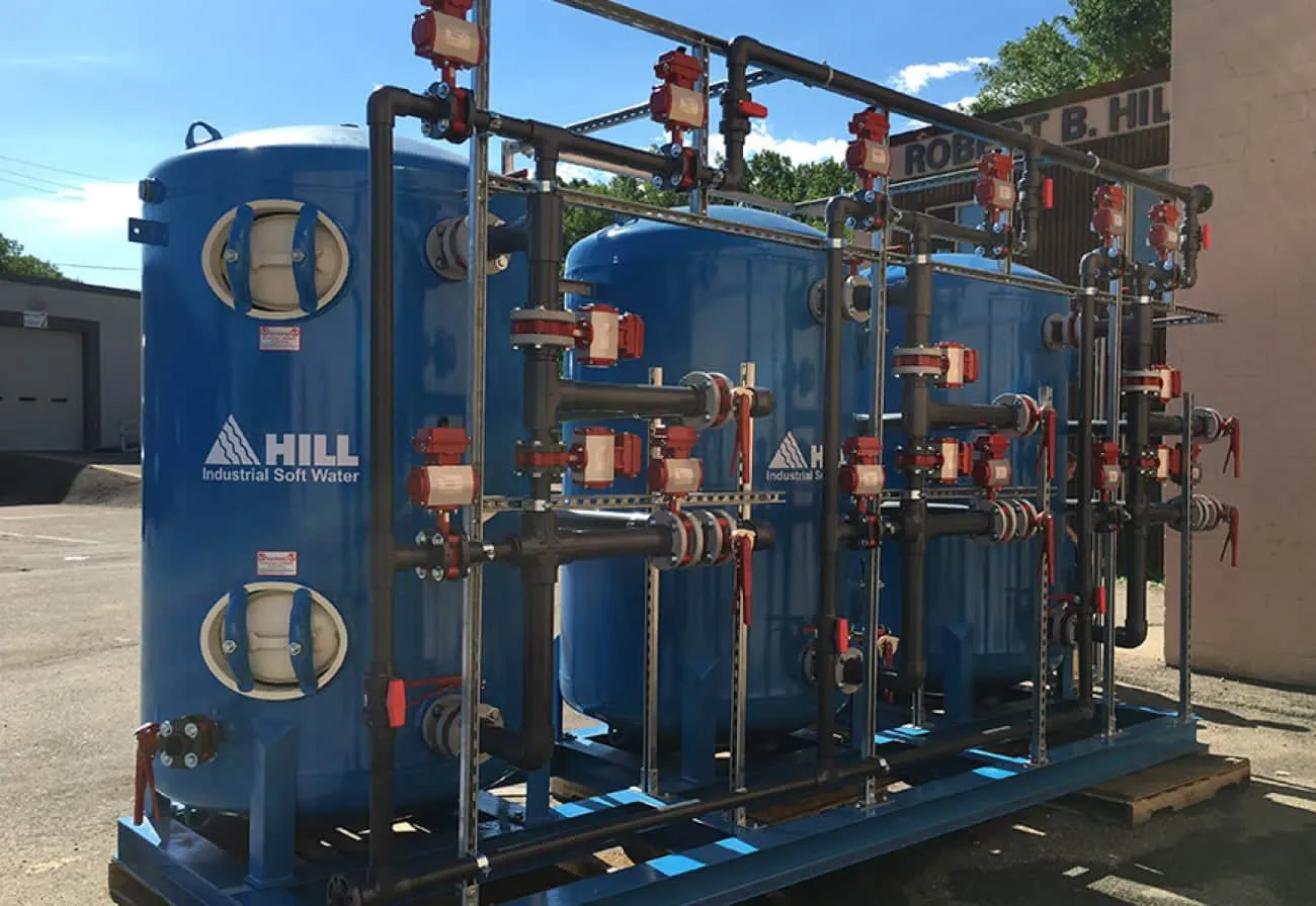 Water treatment for commercial boilers using Hill Industrial soft water softening tanks with valve manifold assembly